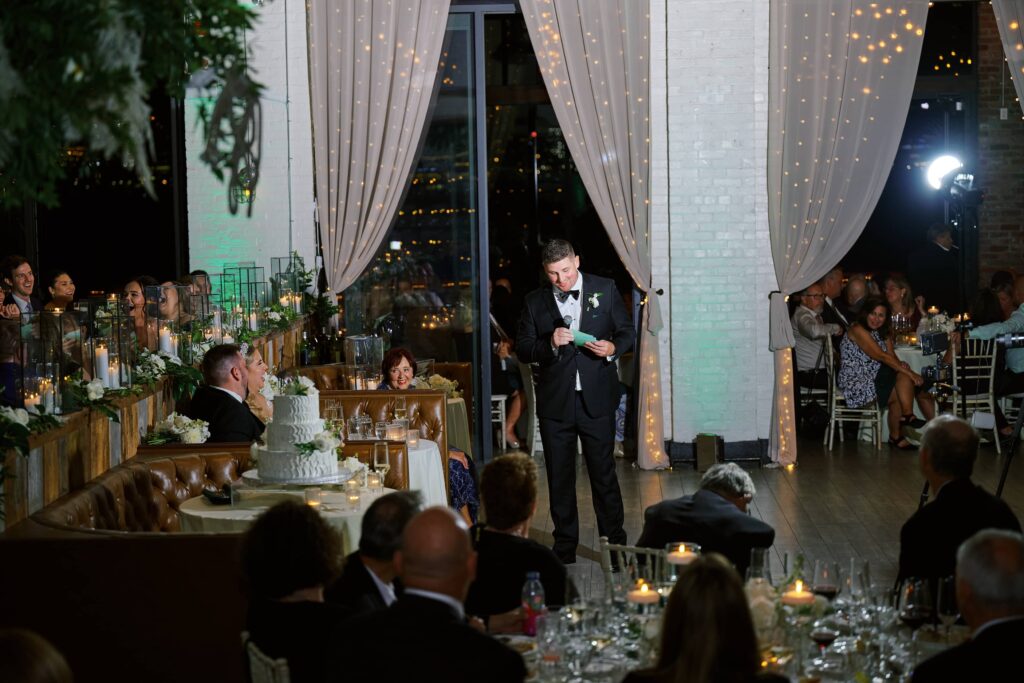 Toasts are offered to Bride and Groom inside the wedding reception at Battello in Jersey City