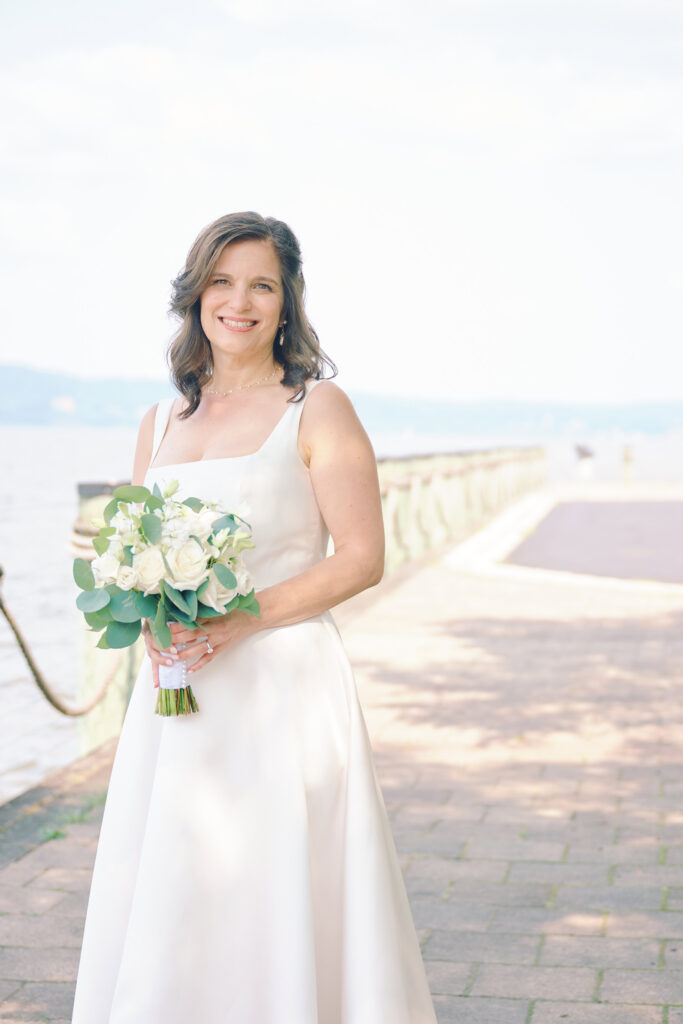 Bridal Portraits, for a Hudson Valley Wedding in New York.  Hudson River can be seen in the back as Bride poses.