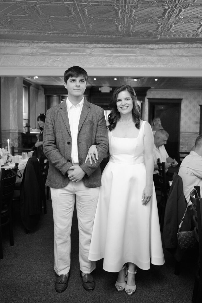 Bride stands with her son before her wedding at the Hudson House in Hudson Valley