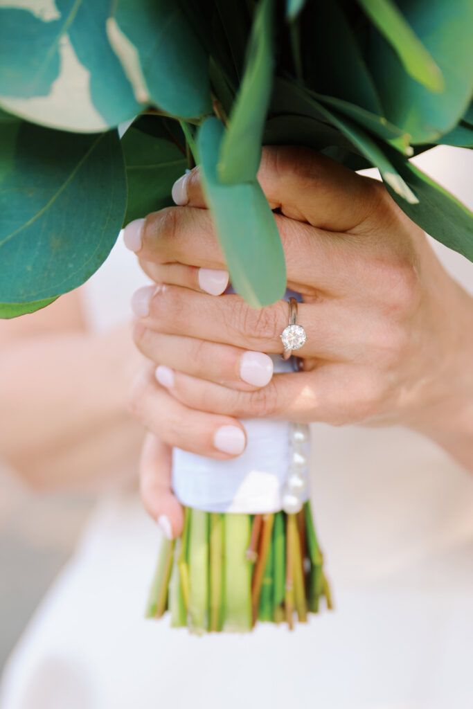 Close up image of Brides hand as she holds on to her Bouquet.  Hudson Valley Bride