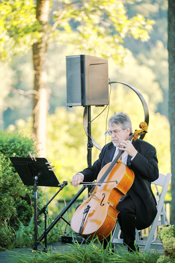 Cellist playing during Ceremony at Saint Clements Castle